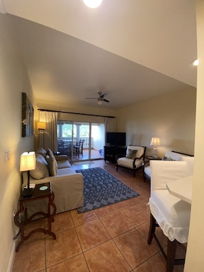 Spacious living room with access to front balcony