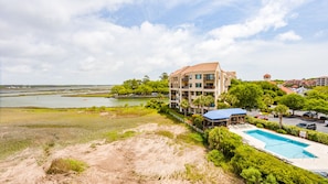 Watch the boats wade in and out of the harbor as you plot your time in the pool!