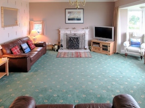 Comfortable, spacious living room | Macinnisfree Cottage, Saasaig, Teangue, Isle of Skye