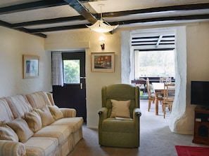 Characterful living room with exposed beams | Hayrake, Ambleside