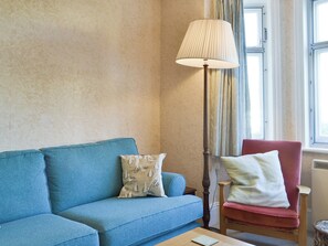 Comfy seating within living room | The Castaway, Mundesley