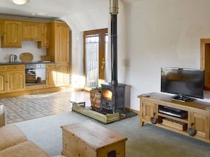 Open-plan living space with a wood burner | Shedend, Nether Dallachy, near Spey Bay