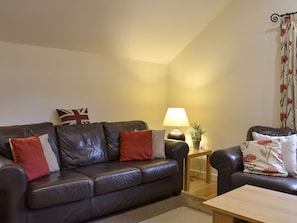 Comfy seating within living room | Tythe Barn, Grindleford