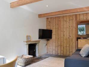 Living area with attractive wood panneling | Clarence Cottage, Appleby-in-Westmorland