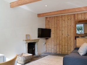 Living area with attractive wood panneling | Clarence Cottage, Appleby-in-Westmorland