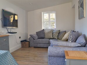 Separate tv area and snug as part of the kitchen/diner | Pear Tree Cottage and The Granary, East Witton, near Leyburn