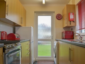 Galley style kitchen with garden access | Talland Bay, Liskeard