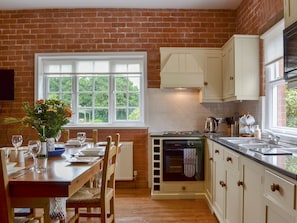 Kitchen/ dining area (dining table converts to snooker table) | The Stables, Eardisland, near Leominster