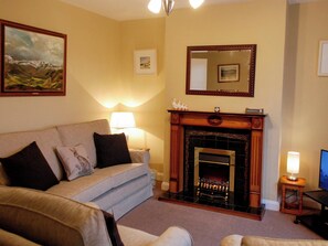 Feature fireplace in charming lounge | The Fells, Keswick