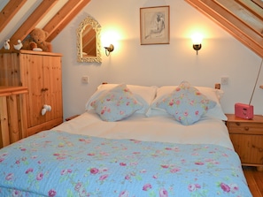 Double bedroom with low beams | Angel Barn, Bitterley, near Ludlow