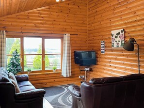 Open plan living space | Ashknowe Log Cabin - Duncrievie Log Cabins, Glenfarg