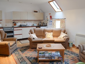 Bright and airy open plan living area with wooden floors | Watermill Cottages - Watermill Cottages, John O’ Groats