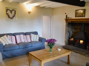 Delightful living room with beamed ceiling and woodburner | Wickwoods, Wath, near Pateley Bridge