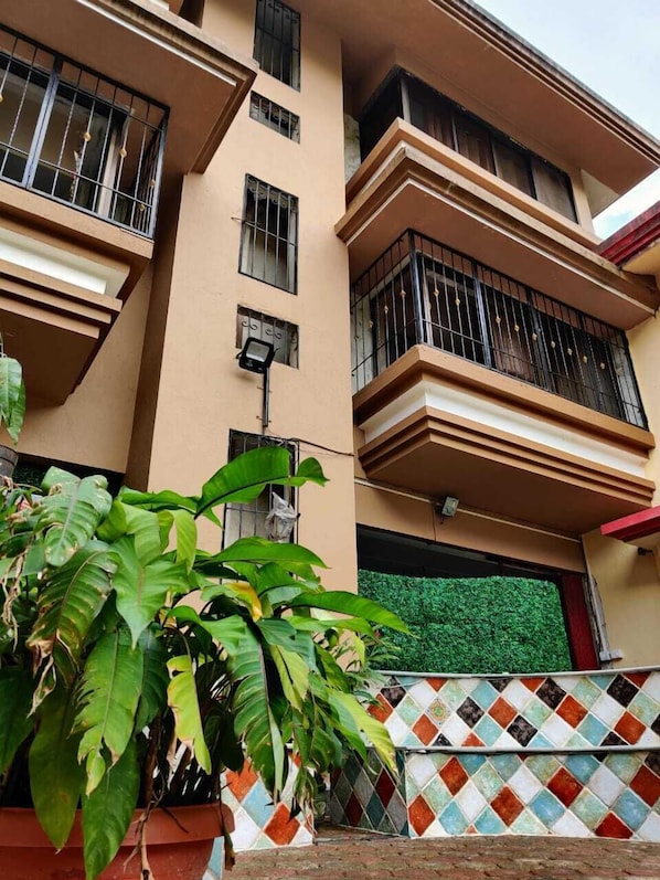 Green Haven Villa facade and patio seating