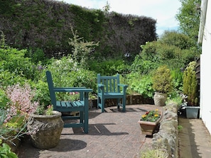 The sitting out area is well planted | Etive Cottage, Warenford, near Belford