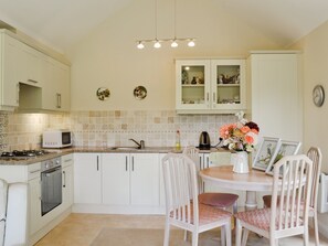 Well equipped, charming, kitchen dining area | Moorland Lodge, Holt Wood, near Wimborne