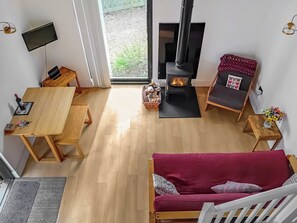 Cosy lounge/dinner with a log burner | Badgers Sett Brook, Brook, near Brighstone