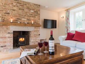 Spacious and comfortable living room with wood burner | White Lodge Cottage, Carlton Miniott, near Thirsk