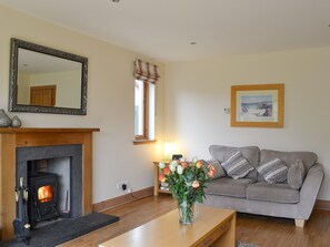 Living room with wood burner | Allt Mor, Aviemore