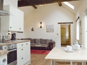 Open plan living/dining room/kitchen with beams throughout | The Smithy, Little Witley, near Worcestershire