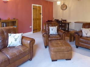 Comfortable leather furniture | Tuppence Cottage, Dulverton