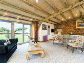 Lovely lounge area with sliding doors to balcony | Knock Old Castle, Largs