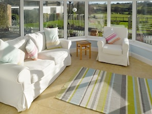 Seating in conservatory | Granary Cottage, Tattingstone, near Ipswich