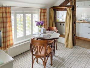 Cosy living/dining room with beams | The Beehive, Betley, near Nantwich