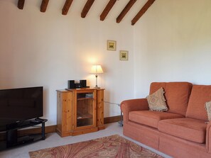 Delightful beamed living room with vaulted ceiling | The Annexe, Lower Withington, near Knutsford