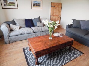 Comfortable living room with a wood burner | The Den at Culross, Culross, near Dunfermline