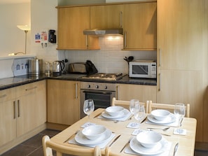 Convenient dining area within kitchen | Newquay Holiday Villa, Newquay