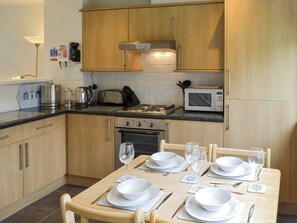 Convenient dining area within kitchen | Newquay Holiday Villa, Newquay