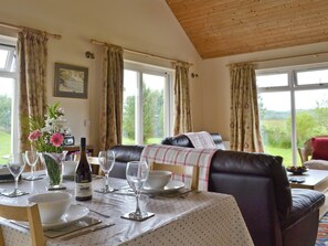 Dining area within open-plan living room | Riverview Cottage, Acharacle