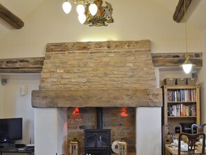 Traditional character features, wood beams and stone fireplace | The Barn at Woodland View, Barlow, near Chesterfield