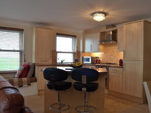 Open plan living space with balcony | Sunsets@Spinnakers, Newquay