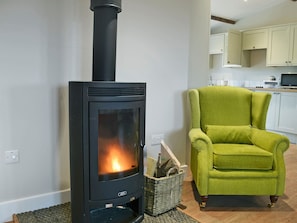Cosy wood burner in living area | Wagtail Cottage - Holmes Farm Country Cottages, Lubenham, near Market Harborough