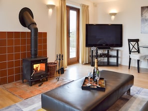 Relax in front of the cosy wood burner | Windmill Barn, Windmill Hill, near Hailsham