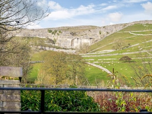 Majestic views of Malham Cove from the rear | Cove View Cottage, Malham