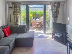 Open plan living space with French doors to patio | Old Church School, Plympton, near Plymouth