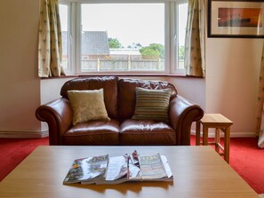 Comfortable leather sofa | Sea La Vie, Mundesley, near North Walsham
