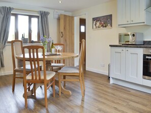 Convenient dining area within kitchen | The Lodge, Wedmore, near Cheddar