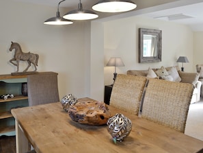 Contemporary dining area with stylish lowered lighting | Willow Tree Cottage at Cottage Farm - Cottage Farm, Foxholes, near Scarborough