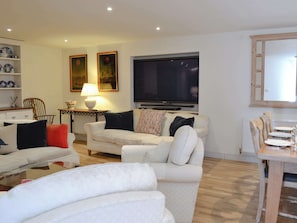 Cosy living room with 65 inch TV | The Coach House, Chulmleigh, near South Molton