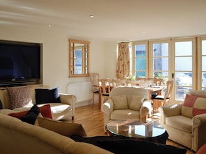 Cosy living room with 65 inch TV | The Coach House, Chulmleigh, near South Molton