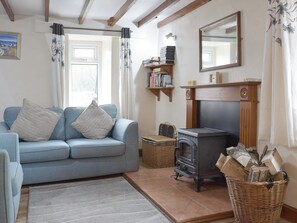 Homely living room with wood burner | The Cottage, Cross Hands, near Carmarthen