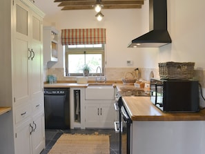 Well equipped kitchen/ dining area | Cowslip Cottage - Wildmore Cottages, New York, near Boston