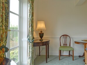 French doors lead out into garden from living/dinging room | Acorn Cottage, Todenham, near Moreton-in-Marsh