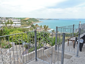 Private patio with incredible coastal views | Morvoren - Polhaun Holiday Apartments, Mevagissey, near St Austell