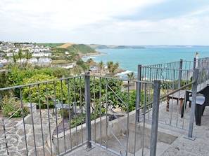 Private patio with incredible coastal views | Morvoren - Polhaun Holiday Apartments, Mevagissey, near St Austell