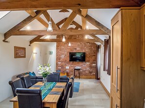 Dining area in open-plan living room | Bramble Barn - Middle Huntingford Barns, Charfield, near Wotton-under-Edge